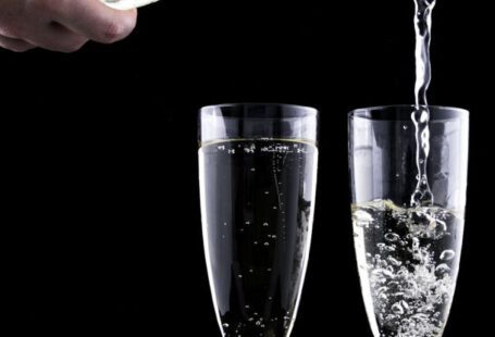 Hybrid Events - Close-up of Beer Glass Against Black Background