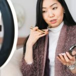 Live Streaming - Vlogger Applying Makeup and Live Streaming with her Phone
